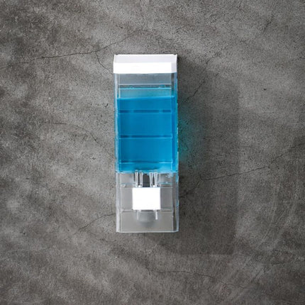 Seinään asennettava saippua- ja shampooannostelija