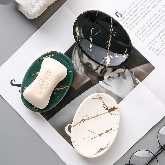 Soikea saippua-alusta marmorikuviolla