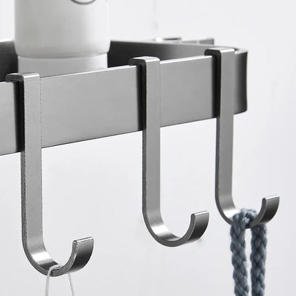 Musta suihkuhylly suihkutankoon ilman porausta