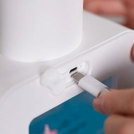 Lasten automaattinen saippua-annostelija kissahahmolla