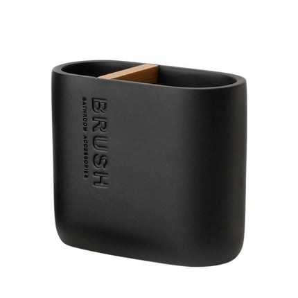 Musta soikea saippua-alusta bamburitilällä