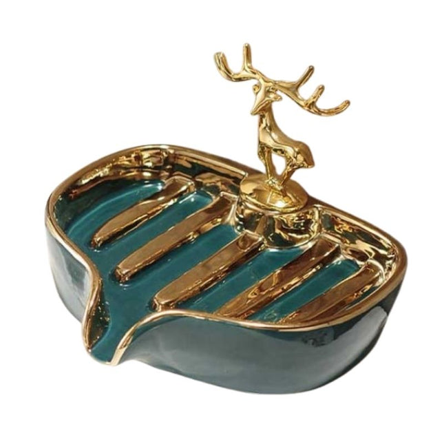 Keraaminen saippua-alusta kultaisella peuralla