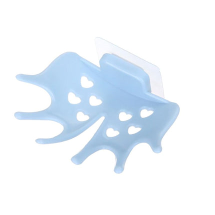 Seinälle kiinnitettävä saippuateline suihkuun