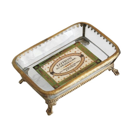 Lasinen saippua-alusta messinkikehyksellä