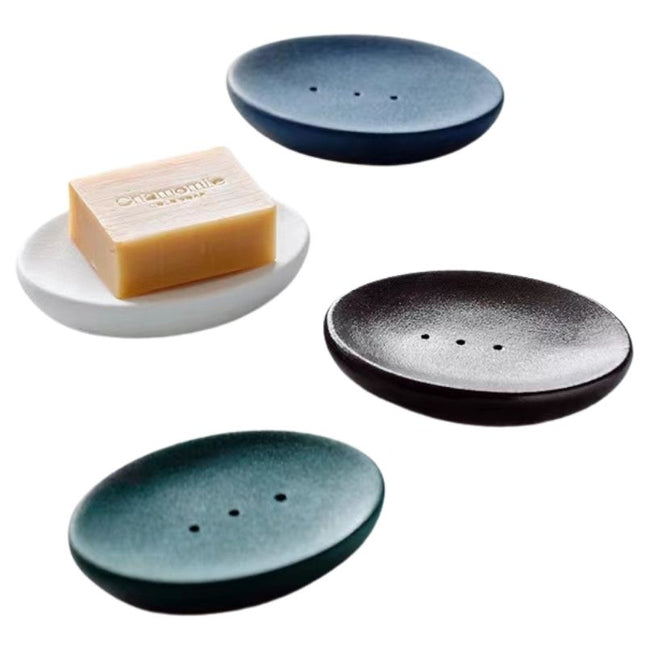 Valkoinen keraaminen saippua-alusta rei'illä