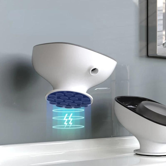 Imukupilla kiinnitettävä saippuateline pesualtaaseen