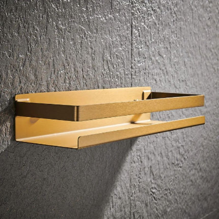 Kultainen design-suihkuhylly seinäkiinnityksellä