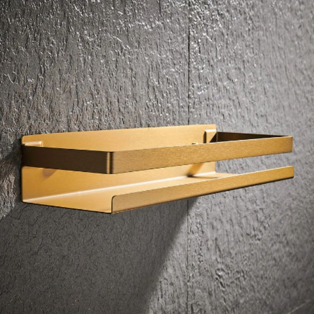 Kultainen design-suihkuhylly seinäkiinnityksellä