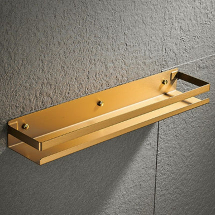 Kultainen design-suihkuhylly seinäkiinnityksellä