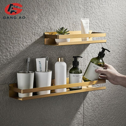 Kultainen design-suihkuhylly seinäkiinnityksellä